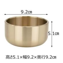 Buddhist bell, sand-covered 